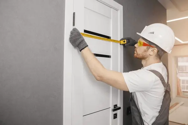 carpenter-worker-installation-process-measures-600nw-1686414658