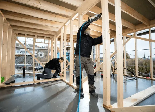 professional-carpenters-drilling-wood-600nw-700595206